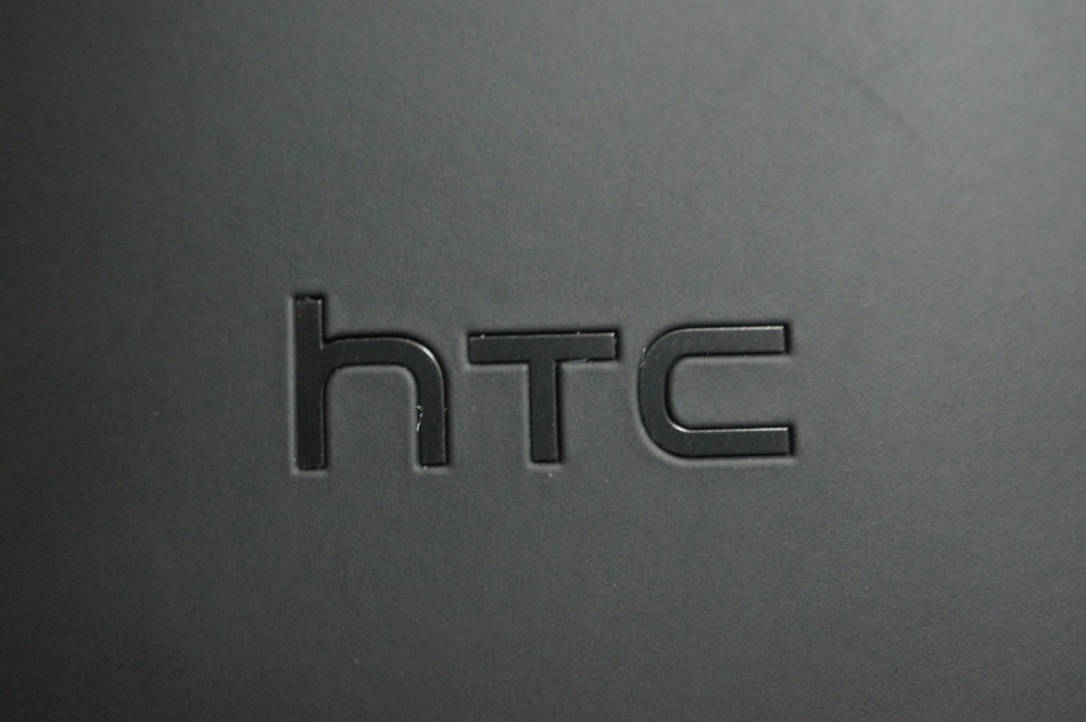 htc brand on gray background #443